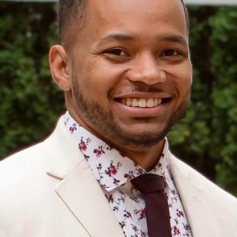 Headshot for Research Associate Coy Carter